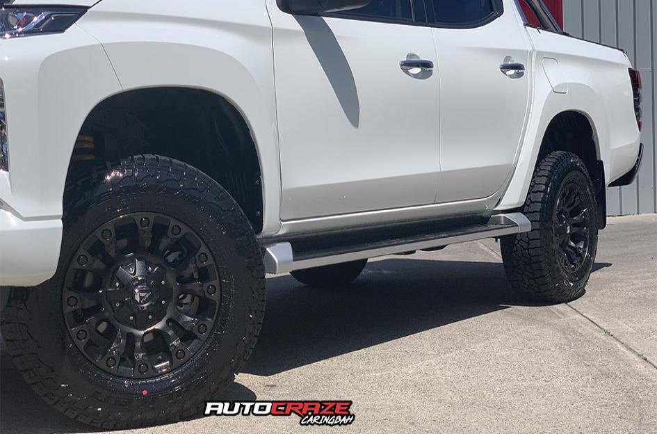 MITSUBISHI TRITON VAPOR BLACK MACHINED WITH DARK TINT